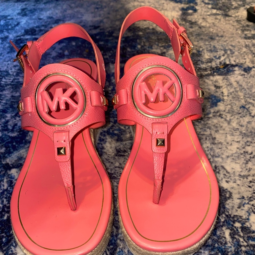 Pink/peach colored Michael Kors Aubrey cut out wedge size 6.5M.